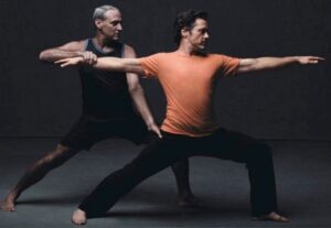 RDJ in a meditative pose or practicing yoga