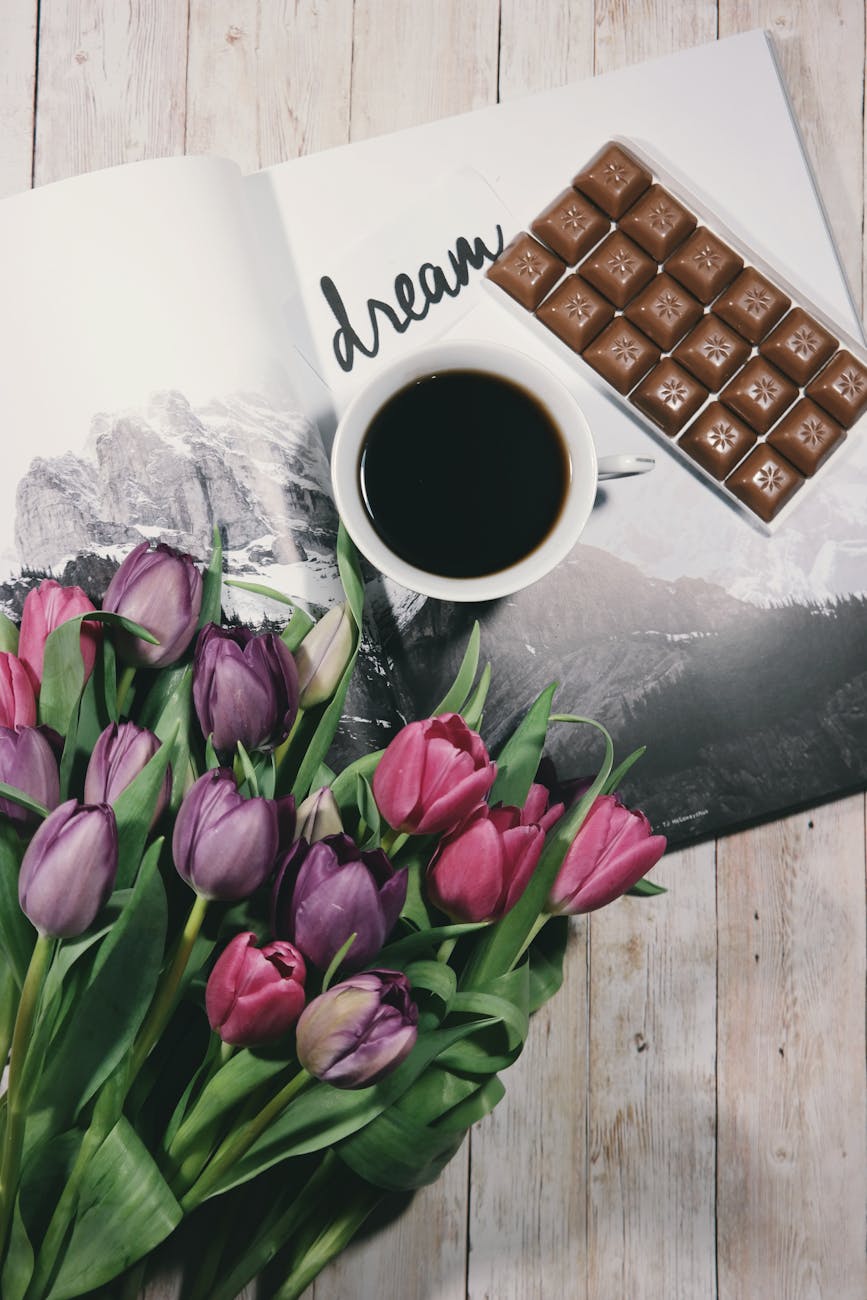 bouquet of tulips near coffee mug