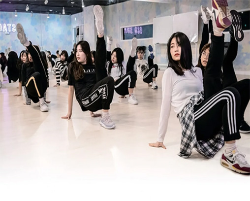 Kpop trainees practicing during a dance session