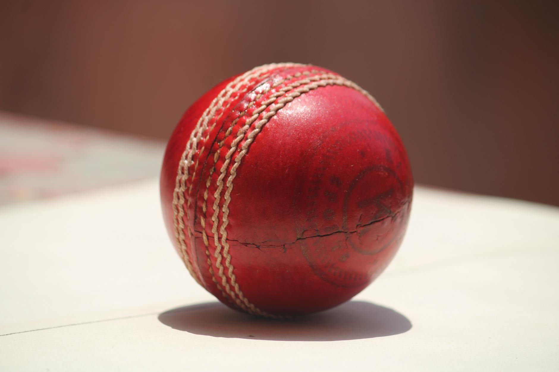 close up photo of leather cricket ball