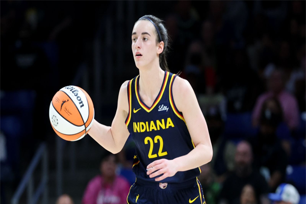 Indiana Fever guard Caitlin Clark 22 in action during the game against the Dallas Wings